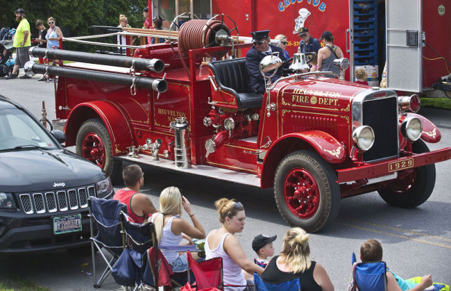 Marching bands, antique trucks highlight parades